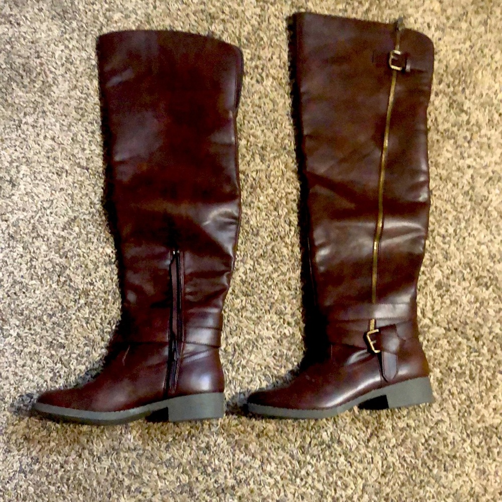 Tall brown flat boots